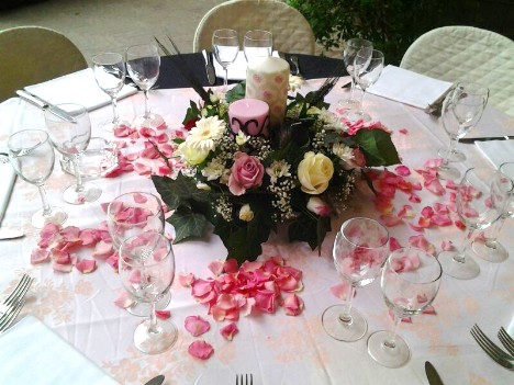 Composizioni di fiori centrotavola per pranzo di matrimonio